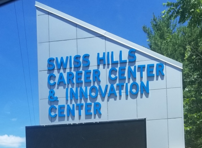 Swiss Hills Career & Innovation Center close up of sign